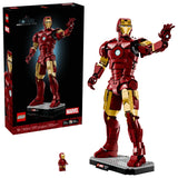 LEGO Marvel Iron Man Mark 3 Collectors' Edition box beside the completed model on its display base and Iron Man minifigure