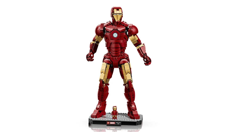 Front view of the LEGO Iron Man Mark 3 model standing on its black and grey display base with the Iron Man minifigure at the front