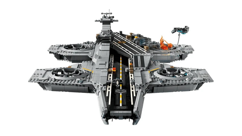 Front view of the LEGO Marvel S.H.I.E.L.D. Helicarrier showing the central runway, four circular rotors, control tower, flame details and Quinjet