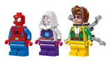 Three LEGO minifigures in red and blue, white and purple, and green and yellow standing side by side