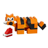 LEGO Medium Creative Brick Box 10696 orange tiger model with black stripes, large eyes and a raised tail.