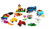LEGO Medium Creative Brick Box 10696 featuring colourful bricks and models including a train, tiger, cars, windmill, flowers and animals.