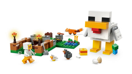 Assembled LEGO Minecraft Chicken Farm showing a large LEGO chicken build beside it's coop on a green base.