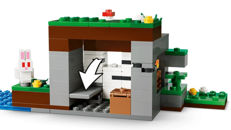 LEGO Minecraft shelter build with white arrow, rabbit figure and chest
