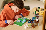 Child building LEGO Minecraft Ghast Station at a table with instructions and model pieces visible