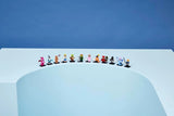 LEGO Shrek Series characters arranged in a curved row on a white display surface against a blue background