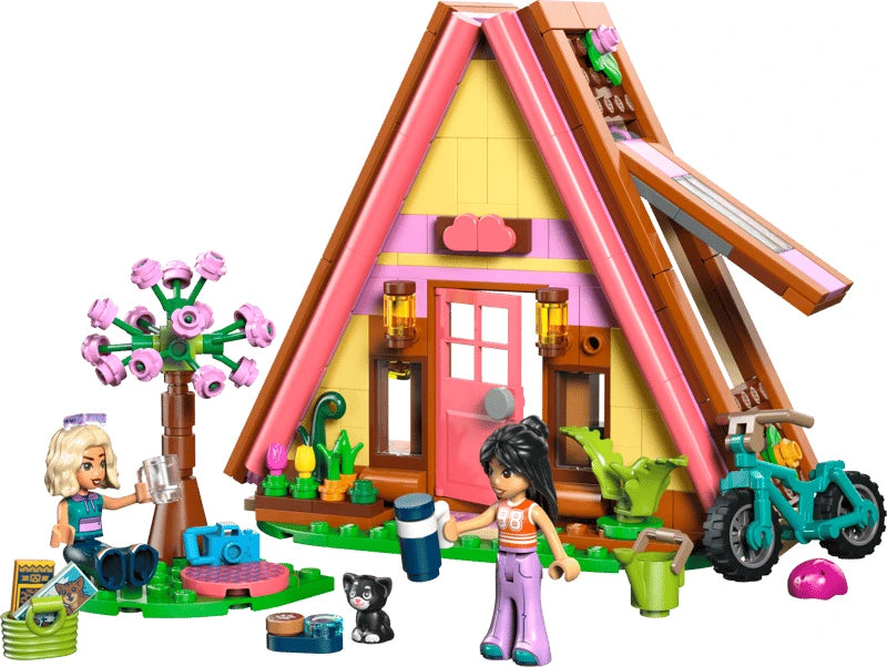 LEGO Friends A-frame cabin build with two mini-dolls, kitten, garden details and bike