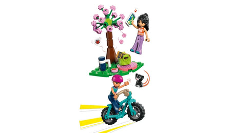 LEGO Friends garden scene with tree, bike, kitten figure and mini-dolls