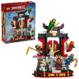 LEGO NINJAGO Ninja Character Display 15th Anniversary set shown with the retail box beside the completed monastery display, featuring red and grey gate structure, steps, cherry blossom tree, stone lantern, and seven minifigures positioned on the build

