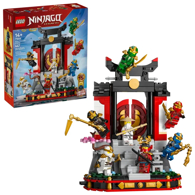 LEGO NINJAGO Ninja Character Display 15th Anniversary set shown with the retail box beside the completed monastery display, featuring red and grey gate structure, steps, cherry blossom tree, stone lantern, and seven minifigures positioned on the build
