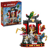LEGO NINJAGO Ninja Character Display 15th Anniversary set shown with the retail box beside the completed monastery display, featuring red and grey gate structure, steps, cherry blossom tree, stone lantern, and seven minifigures positioned on the build
