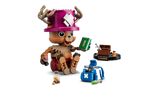 LEGO One Piece Tony Tony Chopper 75643 figure seated beside a green book, bottles, blue backpack and display stand