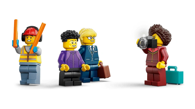 Four LEGO minifigures with suitcases, camera and orange airport wand accessories