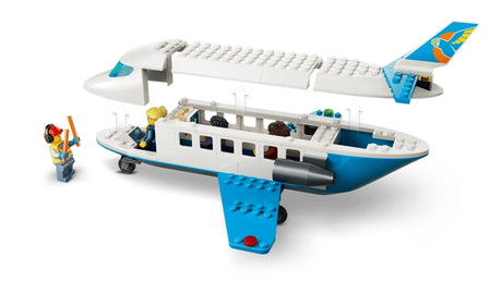 LEGO Passenger Jet with open fuselage showing cabin seats and minifigure inside