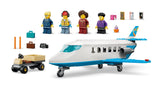 LEGO Passenger Jet set lineup with plane, luggage cart, four minifigures, suitcases and small accessories