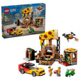 LEGO City Pizza Delivery Experience with Vehicles box beside built pizzeria, sports car, scooter, drone, minifigures and pizza stand