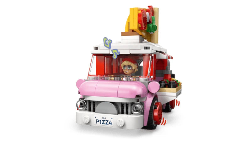 Front view of LEGO Friends pizza truck with mini-doll driver visible inside