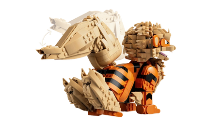 Rear side view of the LEGO Pokémon Arcanine 72160 model with arrows showing tail movement