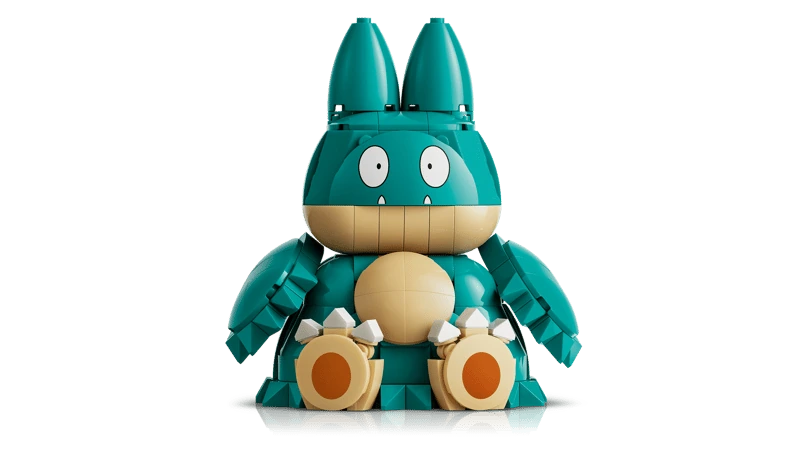 Front view of the LEGO Pokémon Munchlax 72150 figure seated with its arms beside its body