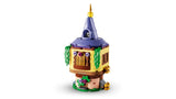 Closed LEGO Rapunzel's Mini Tower with purple roof, gold window and green vine detail