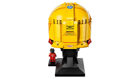 LEGO Scuderia Ferrari HP Lewis Hamilton Helmet shown from the left side with the Lewis Hamilton minifigure and plaque on a white background