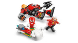 Red and black LEGO Egg Crusher Mech lying behind Knuckles and Dr. Eggman figures with the white board build in front