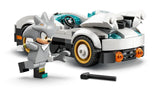 Close view of Silver’s white race car with fins, gold wheel rims, front lights and a wrench accessory placed on the ground in front of the vehicle