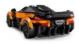 LEGO Speed Champions McLaren W1 car shown from the rear with black diffuser, rear lights, exhaust detailing, and adjustable rear wing on a white background