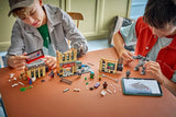 Two children building LEGO Spider-Man vs. Mysterio The Daily Bugle with the LEGO Builder app