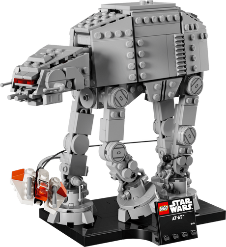 Completed LEGO Star Wars AT-AT Battle of Hoth display model featuring the grey Imperial walker, orange and white Snowspeeder, tow cable and black display base.