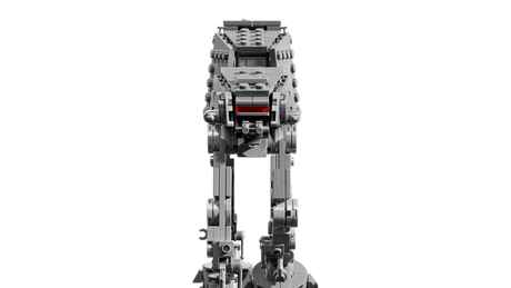 Front view of the LEGO Star Wars AT-AT walker showing its grey armoured head, red cockpit window, four mechanical legs and black display base.