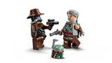 LEGO Star Wars minifigures showing Cobb Vanth holding a blaster pistol and Cad Bane wearing a brown hat and holding dual blasters, with Boba Fett’s helmet placed between them