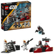 LEGO Star Wars Siege of Mandalore Battle Pack set shown with the retail box beside the completed builds, including the Mandalorian speeder, Clone Trooper barricade, and minifigures arranged around the scene
