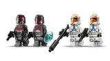 Four LEGO Star Wars minifigures lined up side by side, showing two Mandalorian Super Commandos in dark armour and two 332nd Clone Troopers in white and orange armour, holding their blaster accessories.