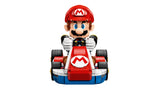 Front view of Mario gripping the steering wheel of the red, white and blue LEGO Standard Kart