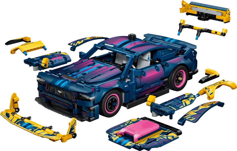Front three quarter view of the LEGO Technic Custom Garage Ford Mustang GT Car 42236 with detached bodywork parts arranged around it