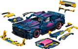 Front three quarter view of the LEGO Technic Custom Garage Ford Mustang GT Car 42236 with detached bodywork parts arranged around it