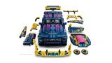 Front view of the LEGO Technic Custom Garage Ford Mustang GT Car 42236 with removable panels, wheels and spoilers arranged beside it