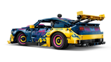 Rear three quarter view of the LEGO Technic Custom Garage Ford Mustang GT Car 42236 with yellow rear bodywork and spoiler