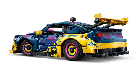 Rear three quarter view of the LEGO Technic Custom Garage Ford Mustang GT Car 42236 with yellow rear bodywork and spoiler