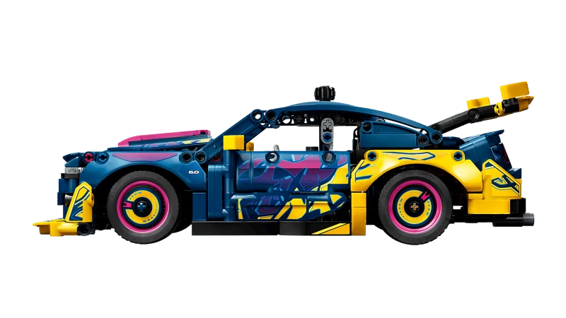 Side profile of the LEGO Technic Custom Garage Ford Mustang GT Car 42236 with blue, pink and yellow bodywork