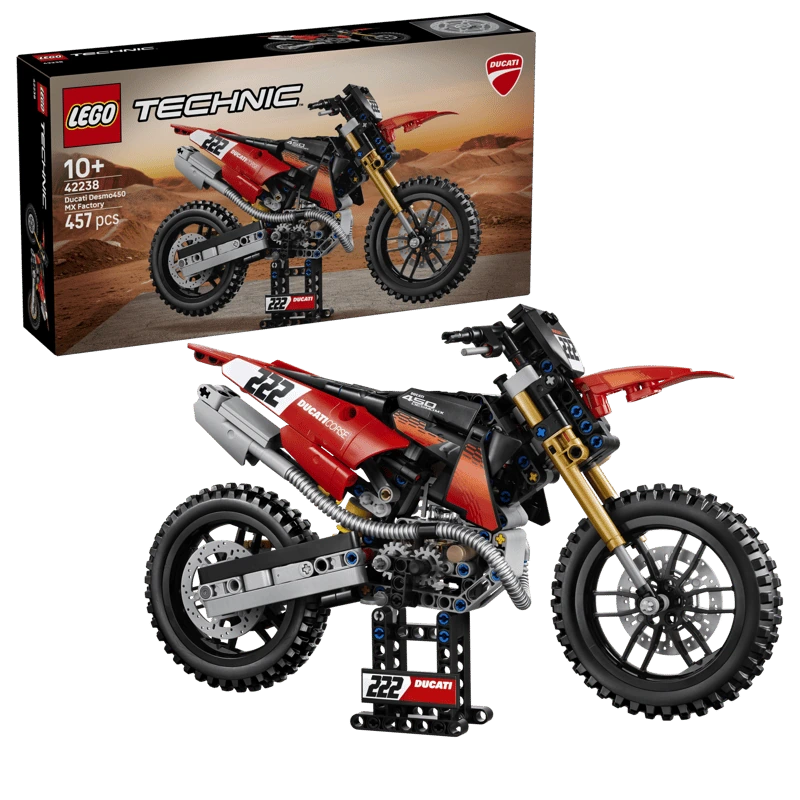 LEGO Technic Ducati Desmo450 MX Factory Motorcycle 42238 box beside the completed motorcycle model 