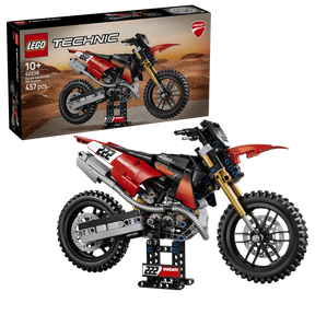 LEGO Technic Ducati Desmo450 MX Factory Motorcycle 42238 box beside the completed motorcycle model 