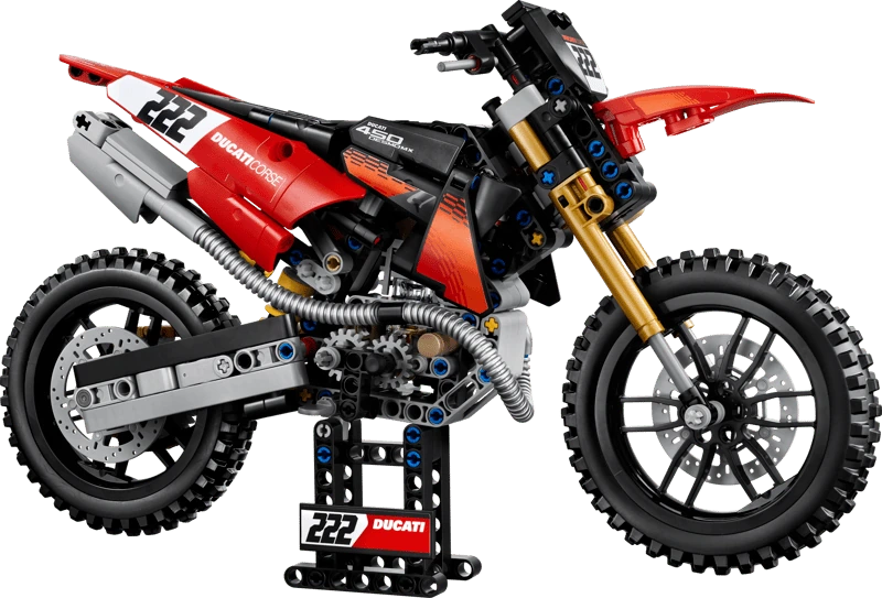 Completed LEGO Technic Ducati Desmo450 MX Factory Motorcycle 42238 model displayed on its stand