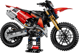 Completed LEGO Technic Ducati Desmo450 MX Factory Motorcycle 42238 model displayed on its stand