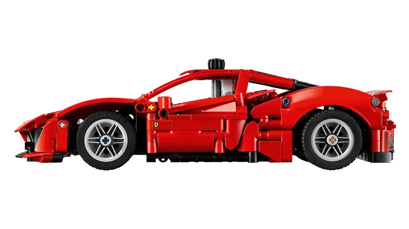 Side profile of the red LEGO Technic Ferrari 488 Pista Car 42235 with grey wheels and a black lower body section