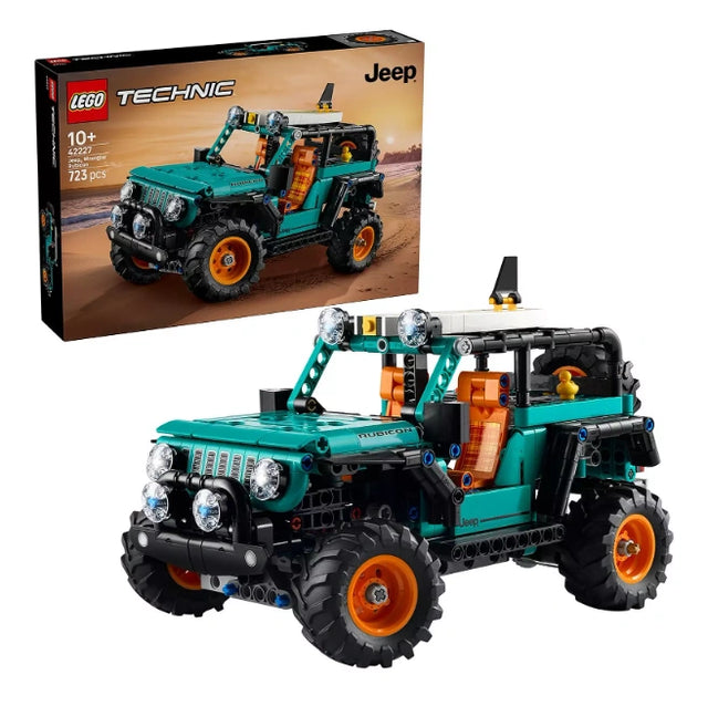 LEGO Technic Jeep Wrangler Rubicon SUV 42227 model with teal body and orange wheels displayed beside retail box