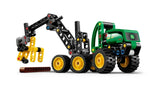 Assembled LEGO Technic John Deere 1470H Wheeled Harvester model shown from the side, with wheeled chassis, articulated body, and extended boom.