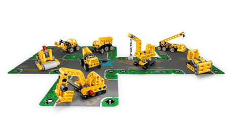 LEGO Technic Mighty Machines 42233 construction vehicles arranged across connected road cards