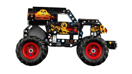 LEGO Technic Monster Jam Grave Digger Fire and Ice monster truck showing the fire themed side with red wheel rims on a white background
